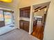 Dining area leads to a covered patio and features built-in cabinets with access to the kitchen at 6640 S Heritage W Pl, Centennial, CO 80111
