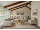 Staged living room featuring vaulted ceilings and modern furniture at 6640 S Heritage W Pl, Centennial, CO 80111