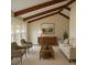 Staged living room featuring vaulted ceilings and large windows at 6640 S Heritage W Pl, Centennial, CO 80111