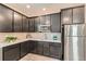 Modern kitchen features stainless steel appliances and ample counter space at 17632 Datura St, Broomfield, CO 80023