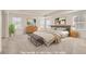 Spacious main bedroom with large windows and tray ceiling. Virtually Staged at 17632 Datura St, Broomfield, CO 80023