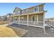 Charming two-story home featuring a large back porch and well-maintained yard at 17632 Datura St, Broomfield, CO 80023