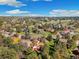 Beautiful aerial view of a lush neighborhood with mature trees and well-maintained homes at 8409 Lightening View Dr, Parker, CO 80134