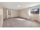 Spacious bedroom with neutral carpet, natural light, and a calming atmosphere at 8409 Lightening View Dr, Parker, CO 80134