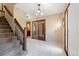 Entryway featuring a staircase and tile flooring at 8409 Lightening View Dr, Parker, CO 80134