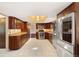 Spacious kitchen with stainless steel appliances, granite countertops, and tile flooring at 8409 Lightening View Dr, Parker, CO 80134