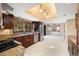 Spacious kitchen with granite countertops, stainless steel appliances, and ample cabinet space at 8409 Lightening View Dr, Parker, CO 80134