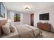 Nicely staged bedroom featuring natural light, comfortable bed and attractive furniture at 8409 Lightening View Dr, Parker, CO 80134