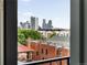 Urban view showcasing skyline through windows, capturing historic architecture at 2880 Zuni St # 309, Denver, CO 80211