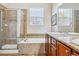 Modern bathroom featuring a separate tub and shower, double sinks, and stylish fixtures, providing comfort and convenience at 6284 Orion Ct # B, Arvada, CO 80403