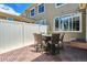 Fenced back patio with tiled floor and outdoor seating is perfect for relaxing or entertaining at 6284 Orion Ct # B, Arvada, CO 80403