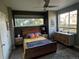 Comfortable bedroom with a large window and a ceiling fan providing ample natural light at 4661 14Th St, Boulder, CO 80304