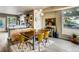 Bright dining room featuring hardwood floors, modern lighting, and a stylish design adjacent to the kitchen at 4661 14Th St, Boulder, CO 80304
