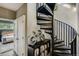 Hallway featuring a stylish spiral staircase and bike decor at 4661 14Th St, Boulder, CO 80304