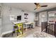Loft area features ample natural light, hardwood flooring, modern décor, and functional workspace at 4661 14Th St, Boulder, CO 80304