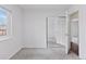 Inviting bedroom with neutral carpet and mirrored closet doors at 15427 E Oberlin Pl, Aurora, CO 80013