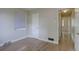Neutral bedroom featuring hardwood floors, white trim and a bright window with shade at 2812 Krameria St, Denver, CO 80207