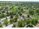 An aerial perspective showcases mature trees and proximity to neighborhood streets at 16839 E Amherst E Ave, Aurora, CO 80013