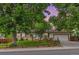 Charming one-story home featuring a well-maintained yard, mature trees, and an attached two-car garage at 16839 E Amherst E Ave, Aurora, CO 80013