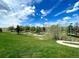 Scenic mini-golf course featuring lush green grass, various obstacles, and clear blue skies at 16839 E Amherst E Ave, Aurora, CO 80013