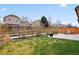 Lawn with patio, an oasis for leisure and activities at 11008 Hayloft St, Parker, CO 80134