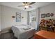 This bedroom features a window, neutral paint, and is -friendly at 11008 Hayloft St, Parker, CO 80134