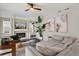 Cozy living room showcases a fireplace with modern decor, comfortable seating, and stylish accents at 11008 Hayloft St, Parker, CO 80134