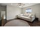 Cozy living room featuring a comfortable sofa with a large window for natural light at 11008 Hayloft St, Parker, CO 80134