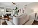 Comfortable living room featuring a modern fireplace, stylish decor, and an open layout at 11008 Hayloft St, Parker, CO 80134