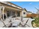 An inviting patio with a fire pit and outdoor seating, perfect for relaxing and entertaining at 11008 Hayloft St, Parker, CO 80134