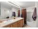 Bathroom with double vanity, updated fixtures, and shower/tub combination at 7440 S Blackhawk St # 4-105, Englewood, CO 80112
