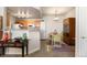 Cozy dining room featuring a breakfast bar and direct access to the kitchen and dining area at 7440 S Blackhawk St # 4-105, Englewood, CO 80112