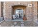Inviting outdoor patio with stone accents, a small table and pleasant view at 7440 S Blackhawk St # 4-105, Englewood, CO 80112