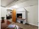 Finished basement with unique indoor brick grill and bonus living space at 1100 Hudson St, Denver, CO 80220