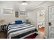 Finished basement bedroom with egress windows and an ensuite bathroom at 1100 Hudson St, Denver, CO 80220