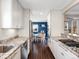 Well-equipped kitchen with granite countertops, stainless steel appliances, and an adjacent dining area at 1100 Hudson St, Denver, CO 80220