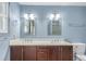 Bathroom with double sinks, modern fixtures, and updated vanity at 3780 E 117Th Ave, Thornton, CO 80233