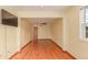 Bonus room has wooden floors and a ceiling fan at 3780 E 117Th Ave, Thornton, CO 80233