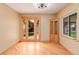 Dining area features beautiful hardwood floors, natural light, and access to the backyard at 3780 E 117Th Ave, Thornton, CO 80233