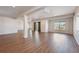 Spacious basement featuring a neutral color palette, wood floors and large windows at 17097 W 87Th Ave, Arvada, CO 80007