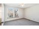 Bright bedroom featuring carpet and lots of natural light from the large windows at 2062 S Helena St # B, Aurora, CO 80013