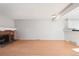 Open concept living room featuring a fireplace, hardwood floors, and natural light at 2062 S Helena St # B, Aurora, CO 80013