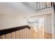 Open floor plan with hardwood floors connecting the living area and kitchen at 2062 S Helena St # B, Aurora, CO 80013