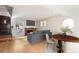 Bright living room staged with modern furniture and decor accents at 2062 S Helena St # B, Aurora, CO 80013