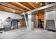 Unfinished basement with exposed ductwork and stairs at 18897 E Linvale Pl, Aurora, CO 80013