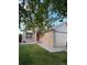Two-story home with a lush green lawn, neutral siding, brick facade, and a two-car garage at 18897 E Linvale Pl, Aurora, CO 80013
