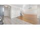 Open-concept with tile flooring and hardwood, access to a kitchen, and a staircase visible at 18897 E Linvale Pl, Aurora, CO 80013