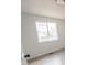 Bright bedroom featuring wood floors and a large window that allows for natural light at 14608 E 52Nd Ave, Denver, CO 80239
