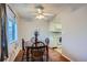 Charming dining area with hardwood floors and a view into the kitchen at 2201 Sable Blvd # 1008, Aurora, CO 80011