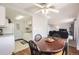 Open dining area connected to the kitchen and living room, perfect for entertaining at 2201 Sable Blvd # 1008, Aurora, CO 80011